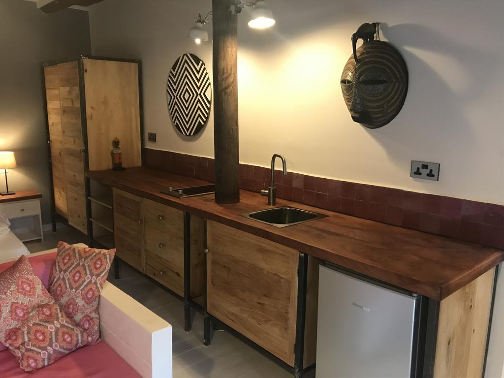 Pili Pili Boutique Hotel Кигали Номер фото